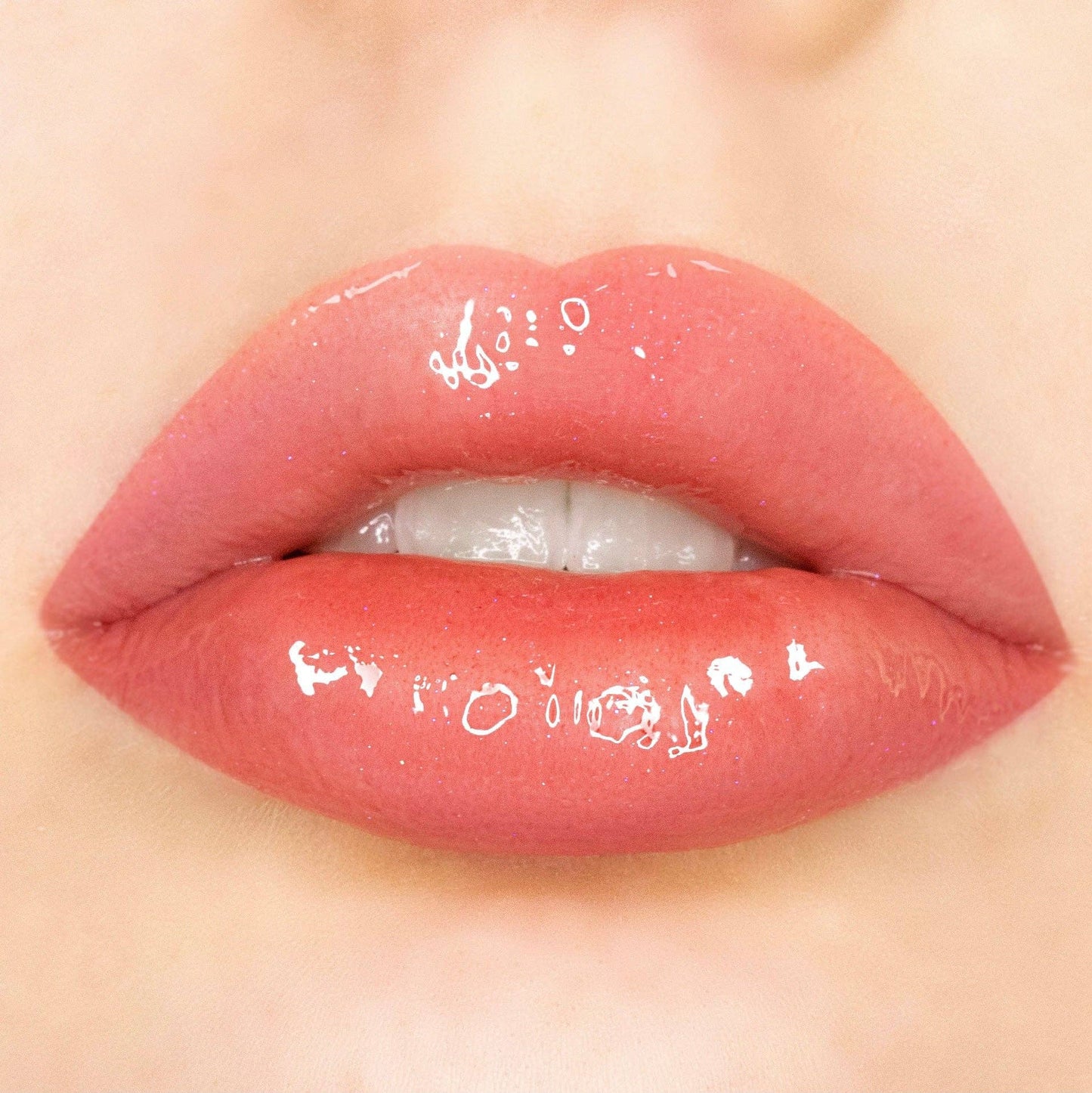 Solar Pink - Sleeky Kiss Plumping Lip Gloss